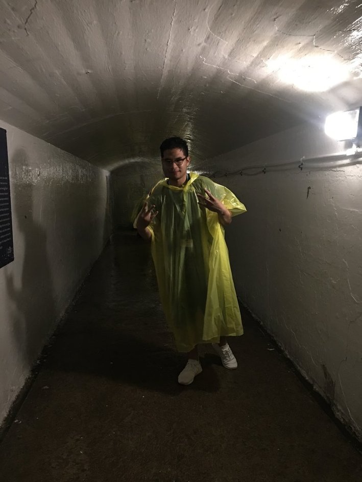 Niagara tunnel visit in a yellow poncho