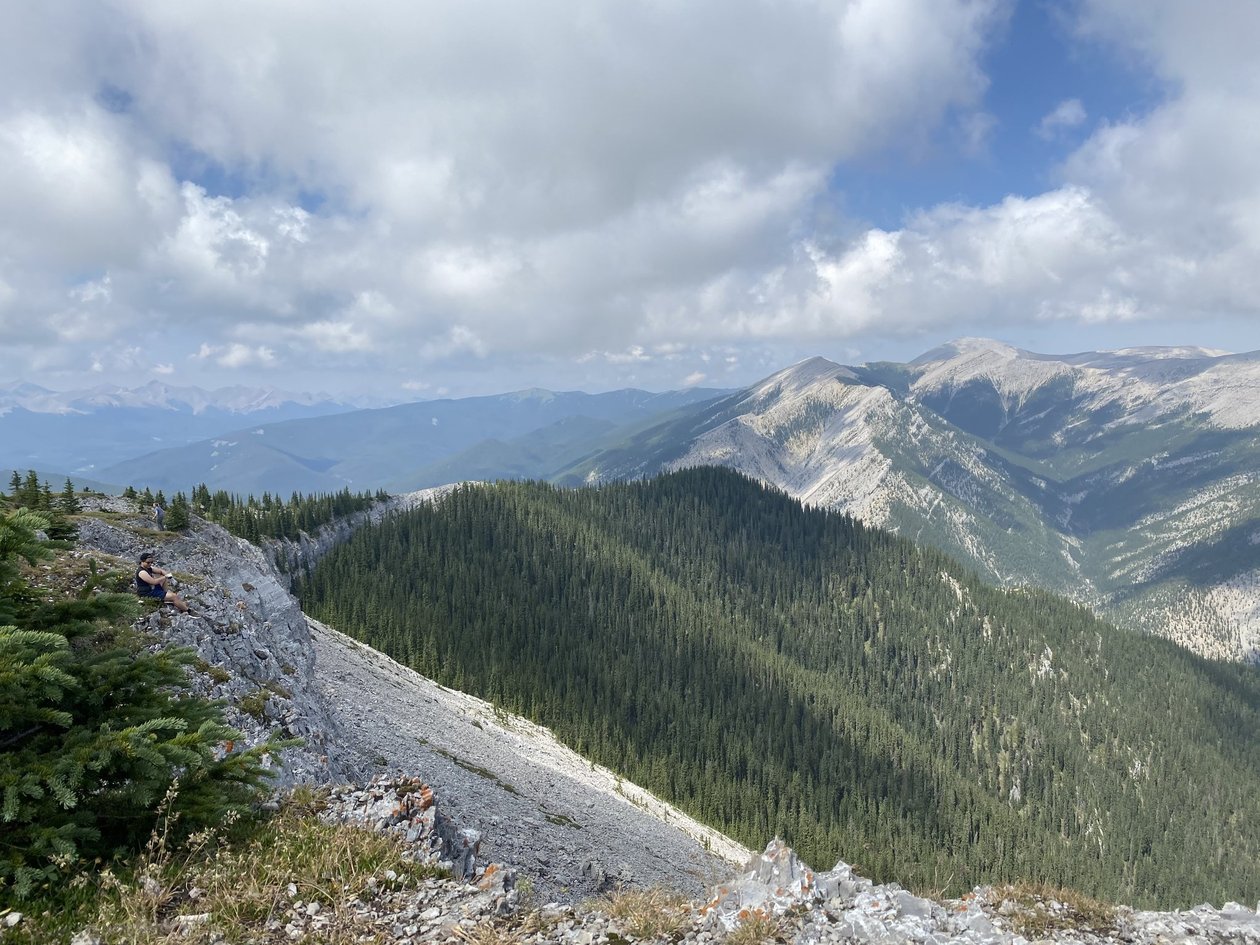 An expansive, beautiful view of the mountain ranges from the top of Prairie Mountain