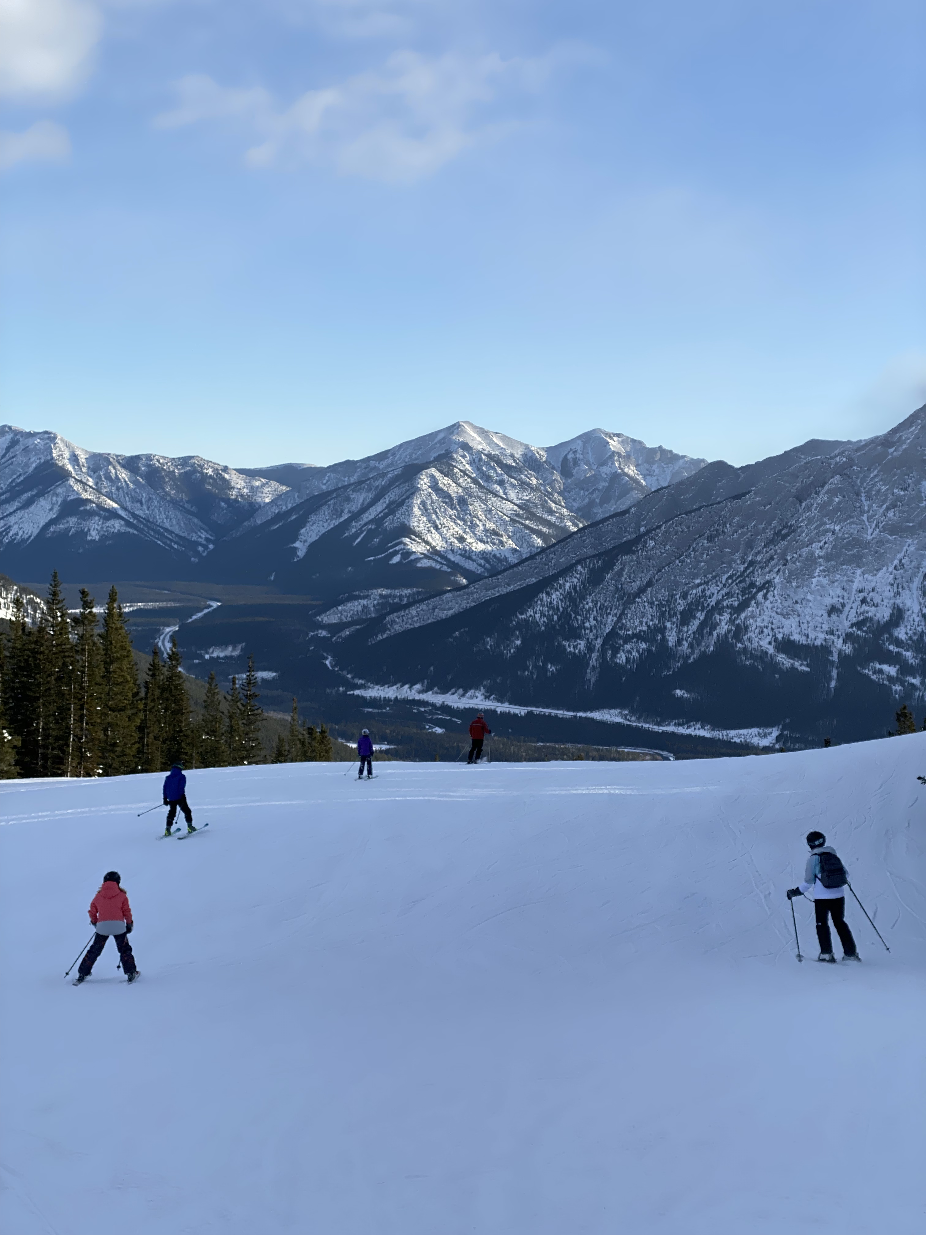 Skiers on the slope at Nakiska