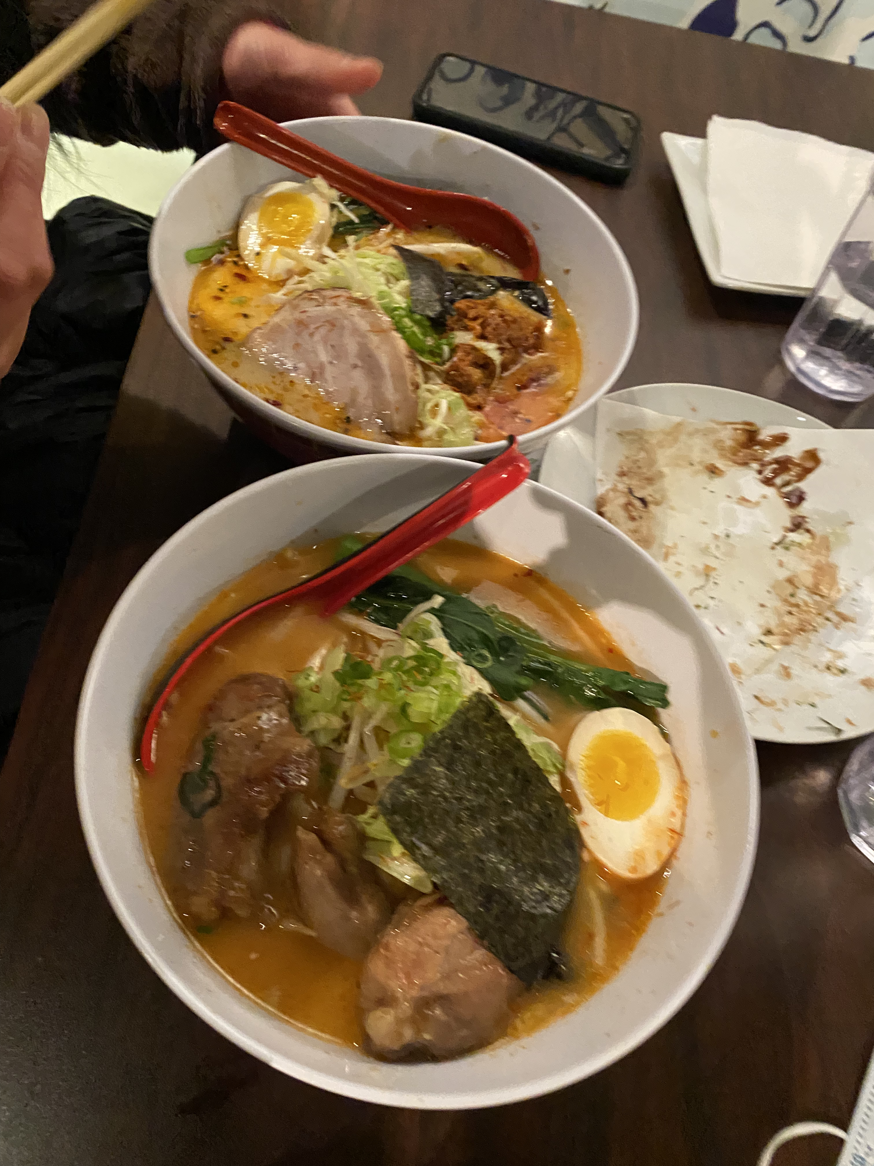 Two bowls of ramen on the table