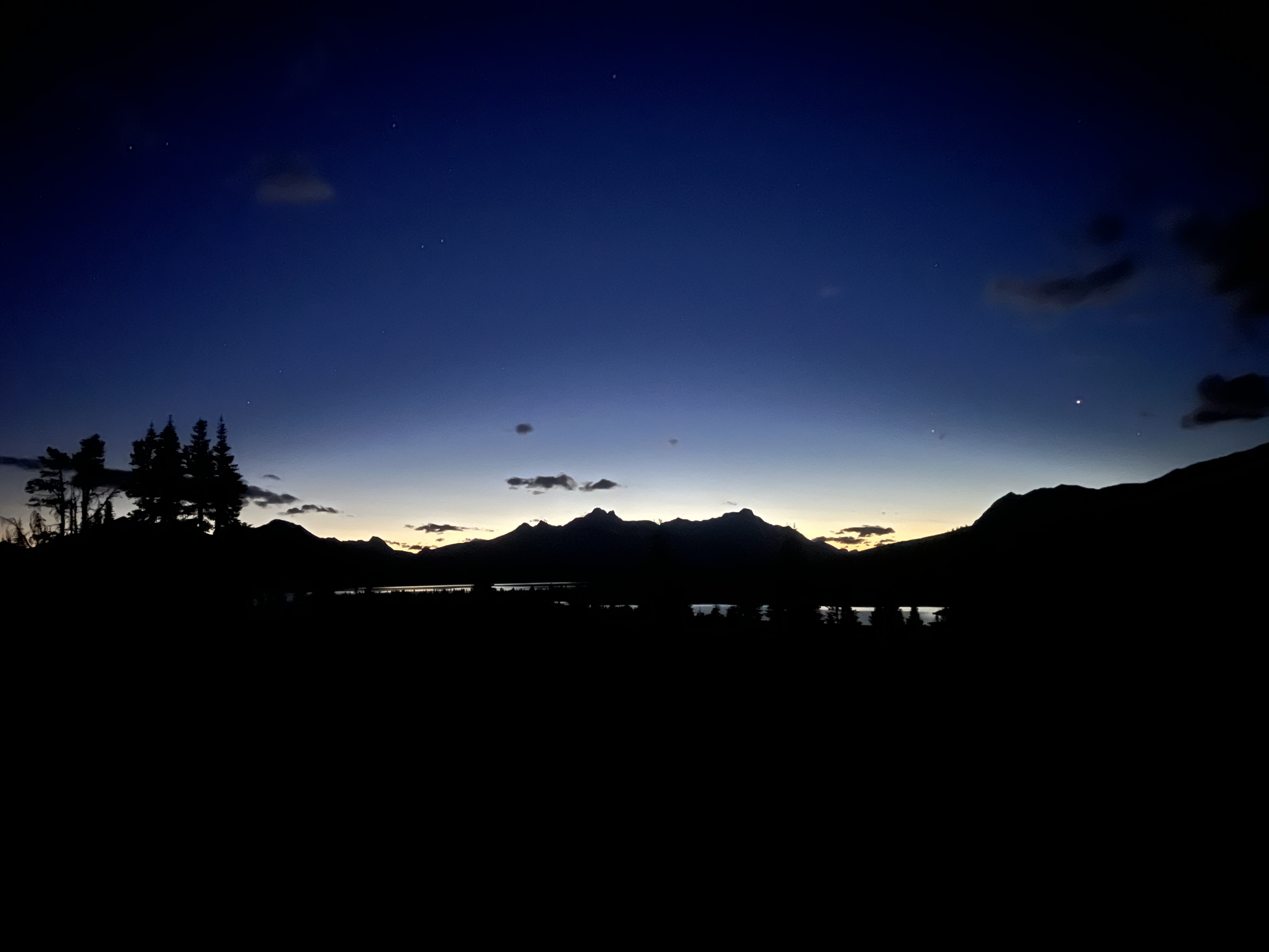 Dark mountain silhouette at night in Tonquin Valley