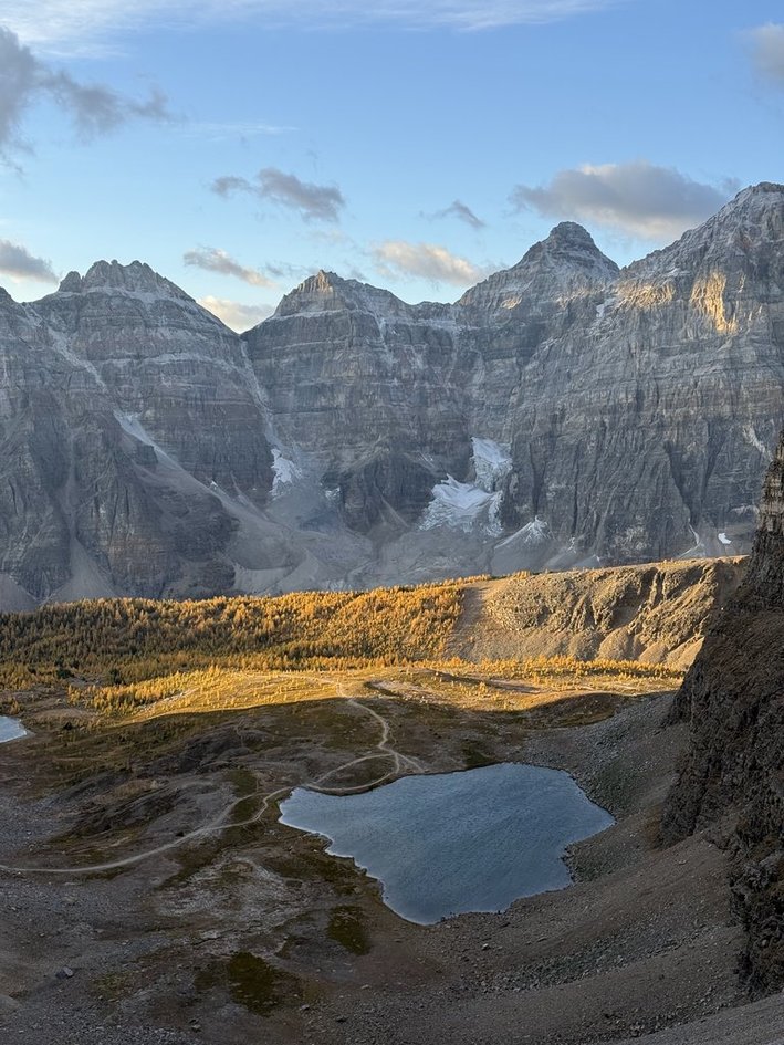 Morning sunlight hitting the golden larches and the Valley of the Ten Peaks